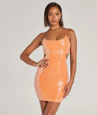 Turn heads in the beaming Sparkle Approach Cutout Bodycon Sequin Mini Dress, a stunning orange sequin dress designed to add sparkle and elegance to your next night out or special occasion.
