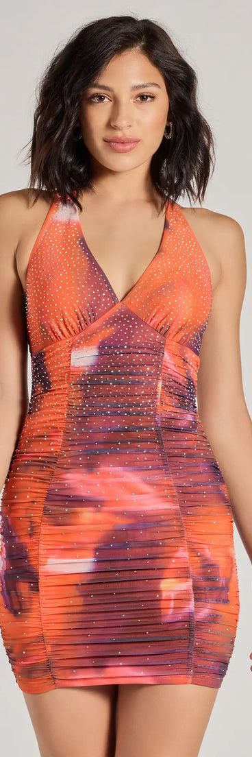 Step into seasonal chic with the Glam Moment Marble Rhinestone Halter Mini Dress, a raisin purple mini dress featuring an above-the-knee cut ideal for cocktail parties, festive gatherings, or clubwear.