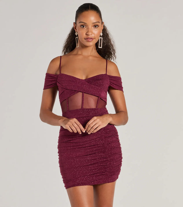 Step into seasonal chic with the Sultry Glitz Glitter Cold-Shoulder Mini Dress, a wine mini dress featuring an above-the-knee cut ideal for cocktail parties, festive gatherings, or clubwear.