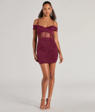 Make a bold statement in the Sultry Glitz Glitter Cold-Shoulder Mini Dress in wine, the perfect summer dress for weddings, cocktail hours, nights out, and/or seasonal celebrations.