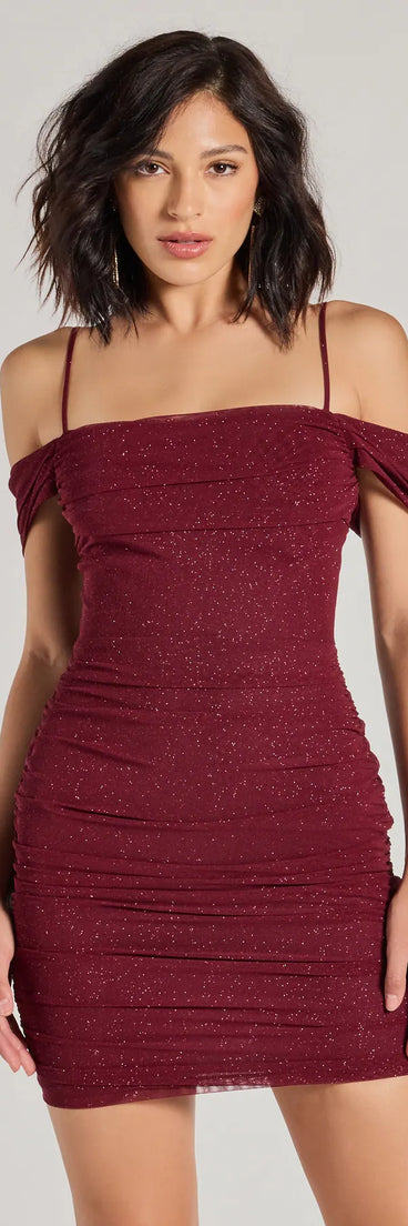 The Glam Affair Cold-Shoulder Glitter Mesh Mini Dress is your new go-to wine dress—effortless, versatile, and made to update your fall style in seconds.