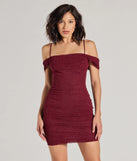Step into seasonal chic with the Glam Affair Cold-Shoulder Glitter Mesh Mini Dress, a raisin purple mini dress featuring an above-the-knee cut ideal for cocktail parties, festive gatherings, or clubwear.