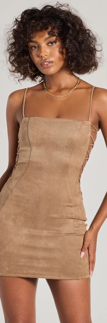 Step into seasonal chic with the Alluring Moment Faux Suede Lattice Cutout Mini Dress, a tan mini dress featuring an above-the-knee cut ideal for cocktail parties, festive gatherings, or clubwear.