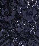 Step into seasonal chic with the Let Me Glow Lace-Up Sequin Mini Dress, a navy mini dress featuring an above-the-knee cut ideal for cocktail parties, festive gatherings, or clubwear.