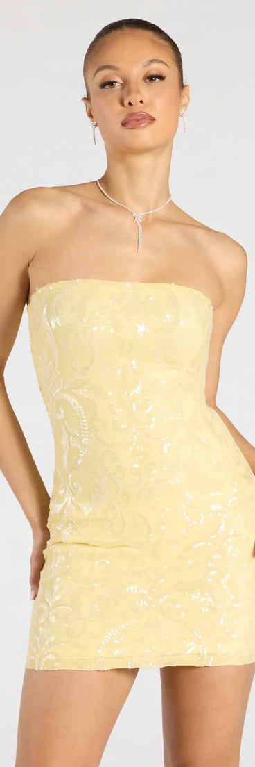 Make a bold statement in the Glam Pose Sequin Strapless Bodycon Mini Dress in yellow, the perfect fall dress for weddings, cocktail hours, nights out, and/or seasonal celebrations.
