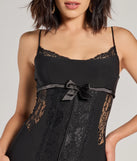 Revamp your 2025 wardrobe with this chic addition, the Sealed With Style Lace and Bow Mini Dress in black, perfect for elevating your style in the new year.