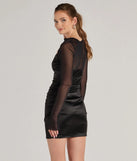 Flaunt your silhouette in the tight Chic Era Asymmetrical Long Sleeve Cutout Mini Dress in black, a bodycon dress that empowers your look with bold style and effortless edge.