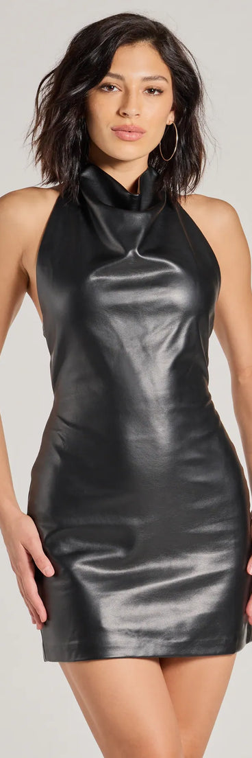 The Sleek Attitude Backless Faux Leather Mini Dress is a mini dress that will make a statement with its short hemline and on-trend details to have you ready for any event!