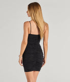Flaunt your silhouette in the tight Sparkly Treasure Glitter Bodycon Mini Dress in black, a bodycon dress that empowers your look with bold style and effortless edge.