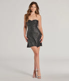 Make a bold statement in the Glow On Girl Sleeveless Glitter Mini Dress in black, the perfect summer dress for weddings, cocktail hours, nights out, and/or seasonal celebrations.