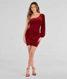 Make a bold statement in the Luxe Alluring Glitter Velvet One-Shoulder Mini Dress in red, the perfect summer dress for weddings, cocktail hours, nights out, and/or seasonal celebrations.