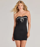 Step into seasonal chic with the Sealed With Charm Ponte Mini Dress, a black mini dress featuring an above-the-knee cut ideal for cocktail parties, festive gatherings, or clubwear.