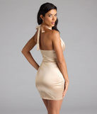 Bring high-impact style to your nightlife in the Sleek Muse Satin Halter Bodycon Mini Dress, a bold gold club dress made for dancing, parties, and unforgettable nights.