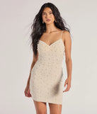 Delicate Glam Faux Pearl Sleeveless Mini Dress, a trendy ivory mini dress featuring modern details and a fresh seasonal hue, perfect for creating chic 2025 looks.