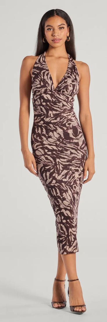 With its mid-calf hem and popular flattering fit, the Fierce Style Zebra Print Mesh Halter Midi Dress in brown nails the balance of trend and ease, redefining go-to midi dresses for any occasion.