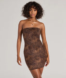 Step into seasonal chic with the Serving Sultry Leopard Faux Suede Strapless Mini Dress, a brown mini dress featuring an above-the-knee cut ideal for cocktail parties, festive gatherings, or clubwear.