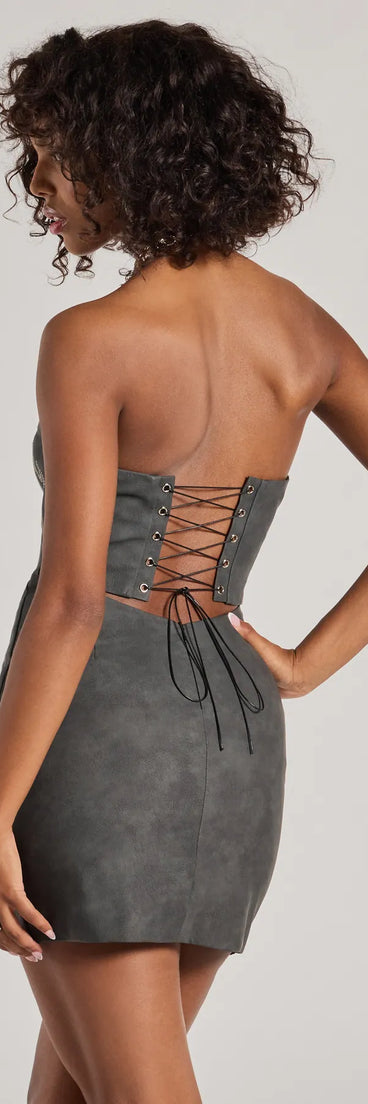 Bring high-impact style to your nightlife in the Western Baddie Strapless Lace-Up Mini Dress, a bold charcoal club dress made for dancing, parties, and unforgettable nights.