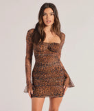 Make a bold statement in the Glam Unleashed Leopard Print Mini Dress in brown, the perfect spring dress for weddings, cocktail hours, nights out, and/or seasonal celebrations.