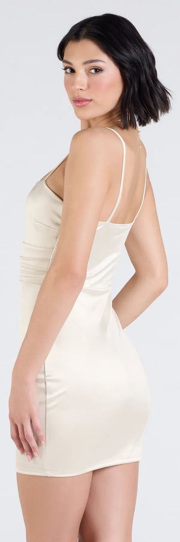 Flaunt your silhouette in the tight Toast To Forever Bodycon Satin Mini Dress in ivory, a bodycon dress that empowers your look with bold style and effortless edge.
