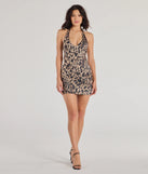 Revamp your 2025 wardrobe with this chic addition, the Love The Leopard Halter Bodycon Mini Dress in brown, perfect for elevating your style in the new year.