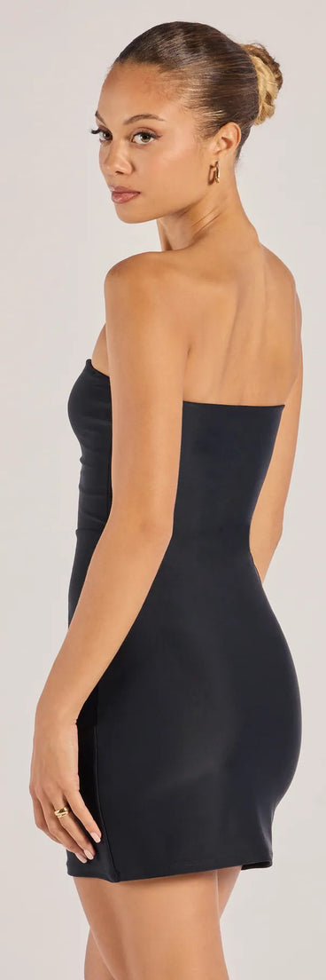 Revamp your 2025 wardrobe with this chic addition, the Serve Sultry Style Strapless Cutout Mini Dress in black, perfect for elevating your style in the new year.
