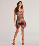 Make a bold statement in the Sassy Status Leopard Print Drop Waist Mini Dress in brown, the perfect spring dress for weddings, cocktail hours, nights out, and/or seasonal celebrations.