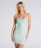 Sensuous Sultry Faux Pearl Rhinestone Mini Dress, a trendy sage green mini dress featuring modern details and a fresh seasonal hue, perfect for creating chic 2025 looks.