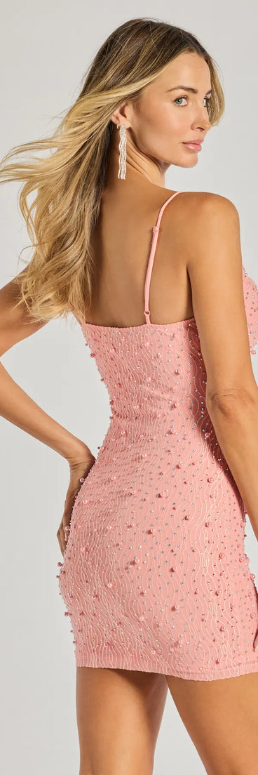 Sensuous Sultry Faux Pearl Rhinestone Mini Dress in pink, a stunning bodycon dress with a flattering fit and feminine details, perfect for date night or girls' night out.