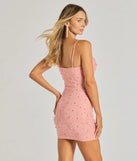 Sensuous Sultry Faux Pearl Rhinestone Mini Dress in pink, a stunning bodycon dress with a flattering fit and feminine details, perfect for date night or girls' night out.