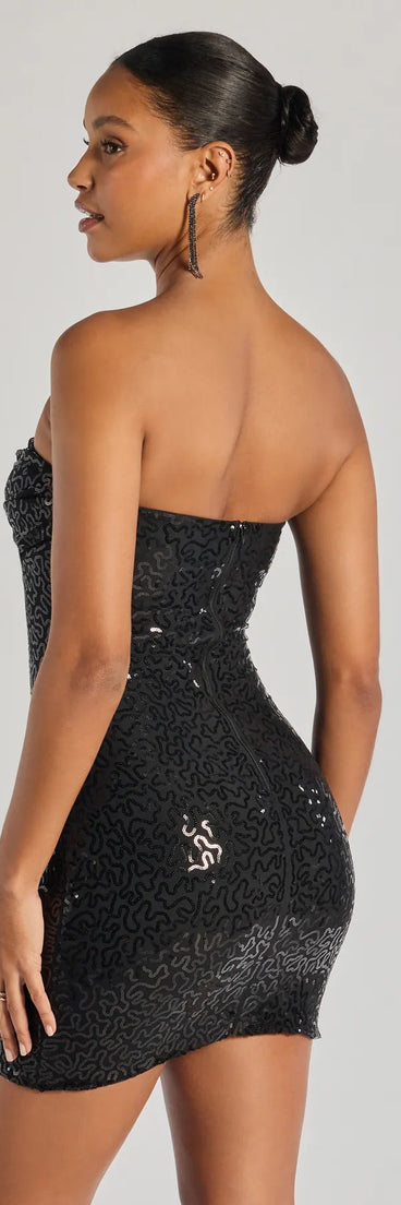 Flaunt your silhouette in the tight Shimmer All Night Strapless Sequin Mini Dress in black, a bodycon dress that empowers your look with bold style and effortless edge.