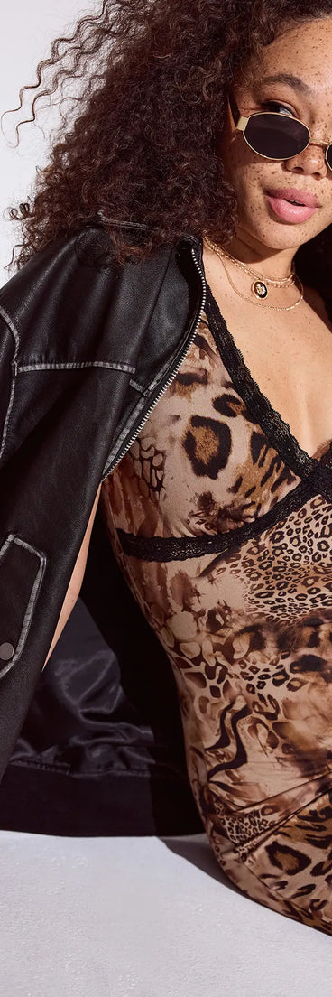 Fashionably Fierce Lace V-Neck Leopard Mini Dress, a trendy leopard print mini dress featuring modern details and a fresh seasonal hue, perfect for creating chic 2025 looks.