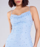 Make a bold statement in the Sensuous Sultry Faux Pearl Rhinestone Mini Dress in light blue, the perfect summer dress for weddings, cocktail hours, nights out, and/or seasonal celebrations.