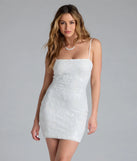 Feel confident and photo-ready in the Sparkle In Motion Floral Sequin Lace-Up Mini Dress, a white graduation dress perfect for 2025 ceremonies and parties.