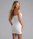 Bring high-impact style to your nightlife in the Enhance Your Chic Strapless Faux Pearl Mini Dress, a bold white club dress made for dancing, parties, and unforgettable nights.