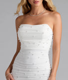 Bring high-impact style to your nightlife in the Enhance Your Chic Strapless Faux Pearl Mini Dress, a bold white club dress made for dancing, parties, and unforgettable nights.
