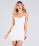 Step into milestone moments with the Decadence Calling Pearl Bodycon Mini Dress, a standout in white dresses perfect for birdal showers, Easter celebrations, and 2025 grad looks.