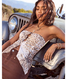 With its midriff cut and trend-forward fit, the Alluring Babe Leopard Cutout Tube Top is a taupe crop top made to pair with skirts, denim, or whatever vibe you're feeling this season.