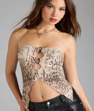 With its midriff cut and trend-forward fit, the Alluring Babe Leopard Cutout Tube Top is a taupe crop top made to pair with skirts, denim, or whatever vibe you're feeling this season.
