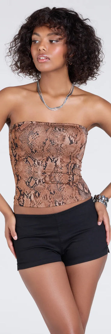 The Wildly Charming Snake Print Crop Top in brown brings edge and energy to your vibe, ready to elevate any festival look or concert outfit.