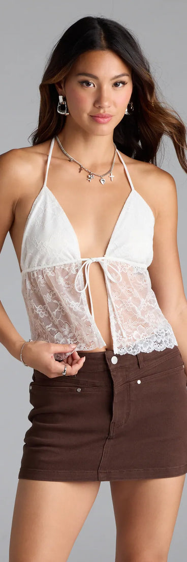 The Unforgettable Babe Sheer Lace Crop Top in white brings edge and energy to your vibe, ready to elevate any festival look or concert outfit.