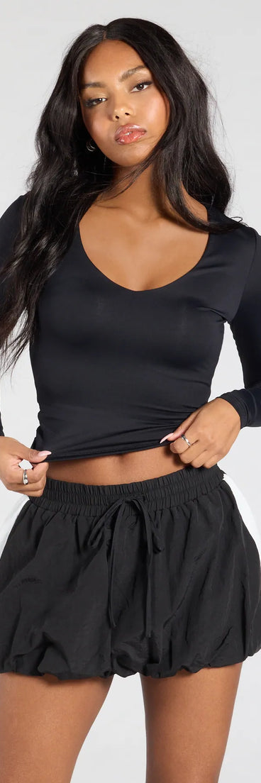 From bold to effortless, the Start With The Basic V-Neck Crop Top lets you define your vibe with black tops that speak your style.
