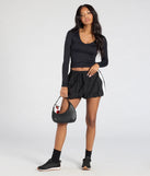 From bold to effortless, the Start With The Basic V-Neck Crop Top lets you define your vibe with black tops that speak your style.