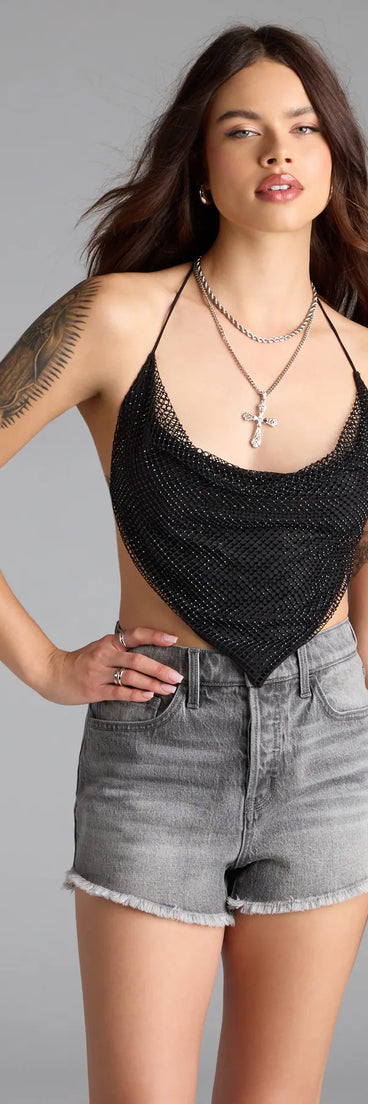 Complete your look with the Destiny Driven Rhinestone Fishnet Crop Top, a trendy black top that’s ready to pair with anything in your fall rotation.