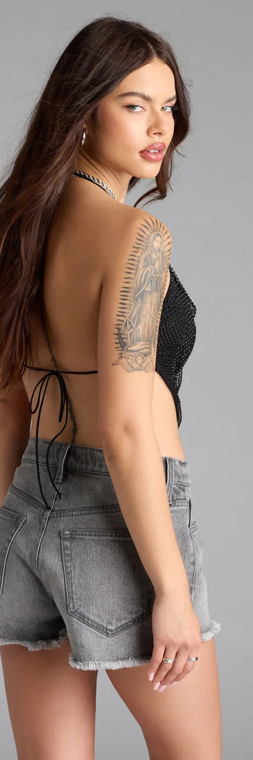 For college campus looks, game day outfits, or a bold going-out vibe, the Destiny Driven Rhinestone Fishnet Crop Top is an on-trend black crop top that easily styles with your favorite denim.