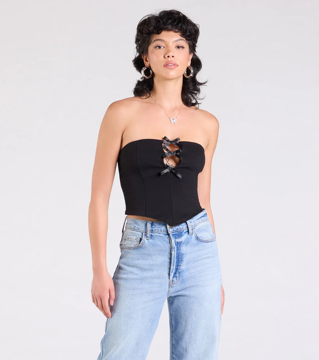 Stay on-trend this season with the Lookin' Cute Bow-Trim Cutout Top in black, a must-have for creating stylish and effortless spring outfits for women.
