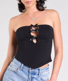 Stay on-trend this season with the Lookin' Cute Bow-Trim Cutout Top in black, a must-have for creating stylish and effortless spring outfits for women.