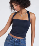Stay on-trend this season with the Essential Energy Halter Crop Top in black, a must-have for creating stylish and effortless spring outfits for women.