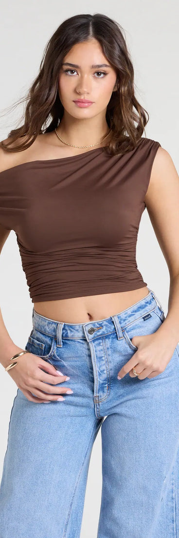 Complete your look with the Flirty Style One Shoulder Crop Top, a trendy brown top that’s ready to pair with anything in your fall rotation.