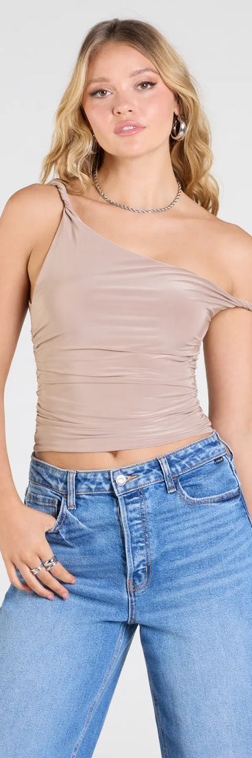 The Iconic Chic One-Shoulder Crop Top in tan brings edge and energy to your vibe, ready to elevate any festival look or concert outfit.