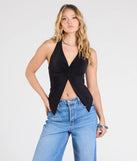 The Routinely Cute Halter Knot Crop Top in black brings edge and energy to your vibe, ready to elevate any festival look or concert outfit.